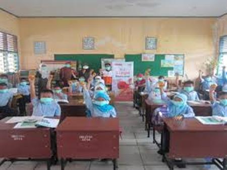 Relawan RZ Pekanbaru Sebar 5.000 Masker Ke Sekolah Dasar