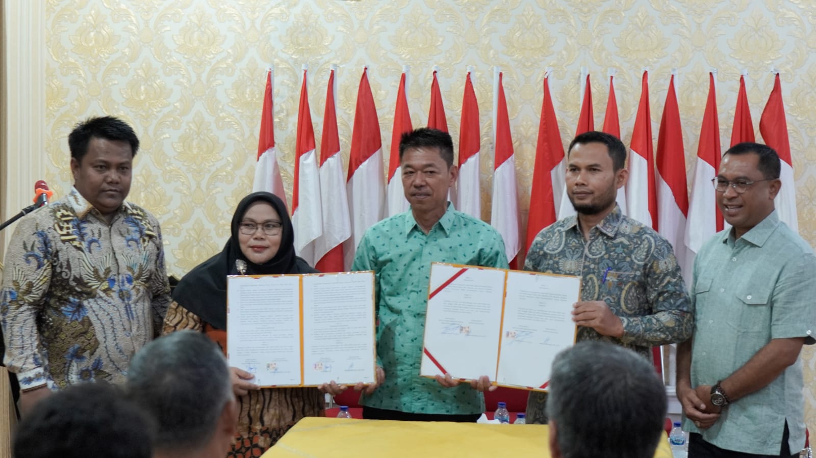 Perdana se-Riau, Pemkab Rohil Tandatangani NPHD Bersama KPU dan Bawaslu