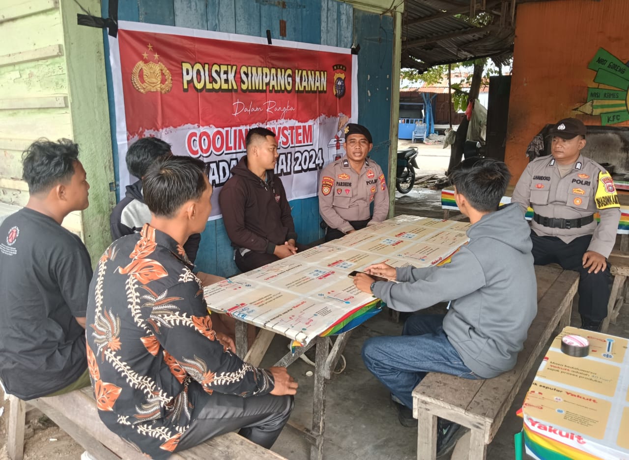 Kanit Samapta Polsek Simpang Kanan Pimpin Cooling System di Jalan Yazid Hamta
