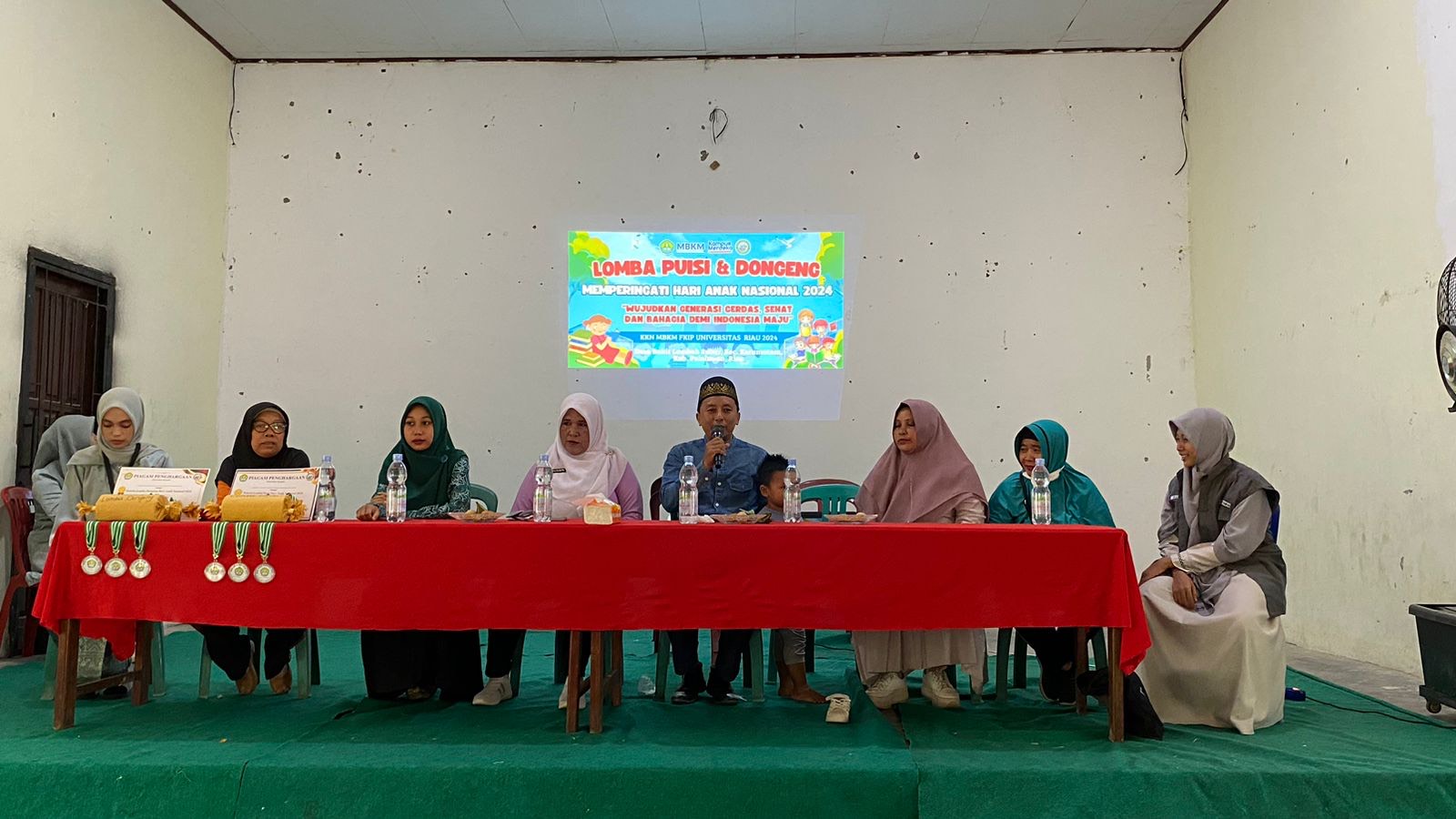 Kukerta MBKM FKIP Unri di Desa Bukit Lembah Subur Semarakkan Lomba Dongeng dan Puisi