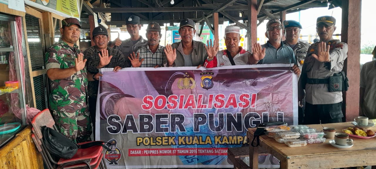 Plh Kapolsek Kuala Kampar  Pimpin Sosialisasi  Satgas Saber Pungli  di Ruang Tunggu Pelabuhan