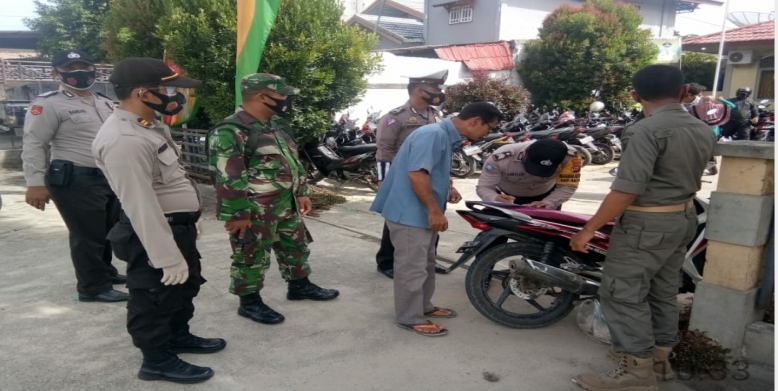 Cegah Penyebaran Covid-19, Polsek Tanah Putih Laksanakan Operasi Yustisi