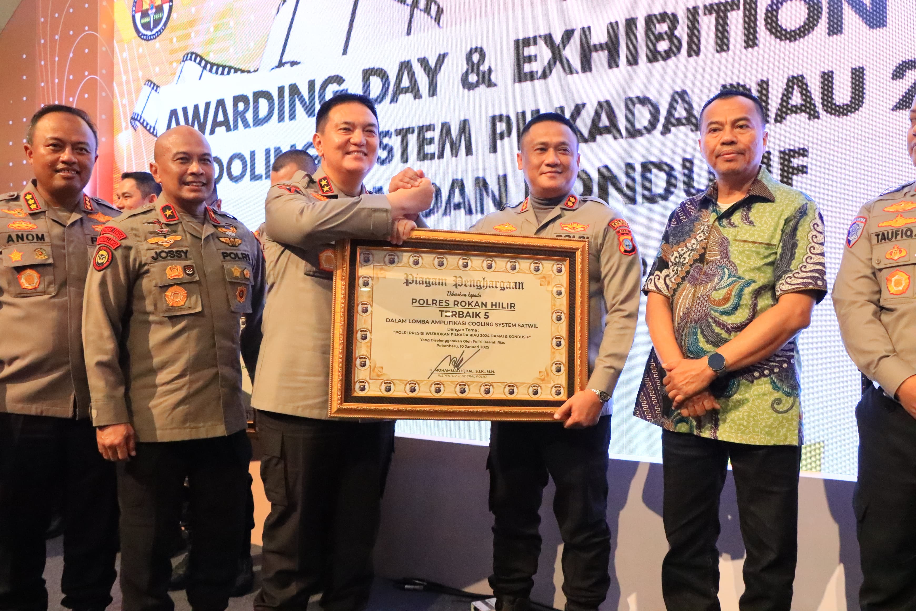 Polres Rohil Raih Terbaik 5 Se-Polda Riau dalam Coolyng System Pilkada 2024, dan Juara 1 Lomba Jurnalistik Meme