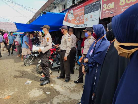 Melibatkan Berbagai Pihak, Mahasiswa Kukerta UNRI Sosialisasikan Penggunaan Masker