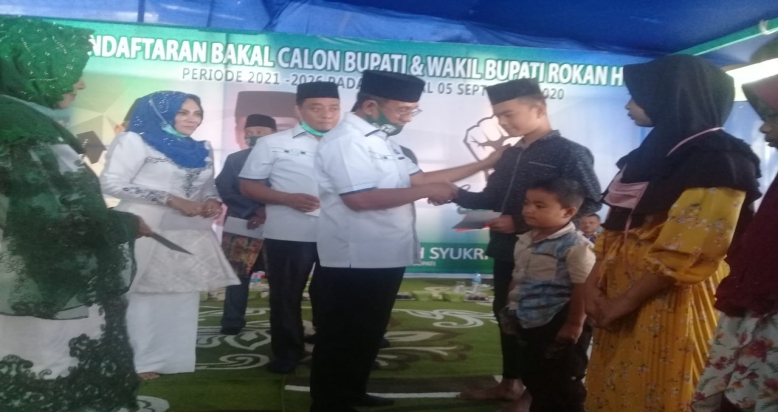 Sebelum Mendaftar ke KPU, Paslon Hafit Syukri dan Erizal Santuni Anak Yatim