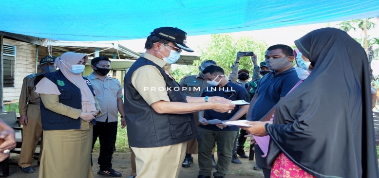 Bupati HM.Wardan Salurkan Bantuan  Korban Kebakaran di Desa Teluk Pantaian